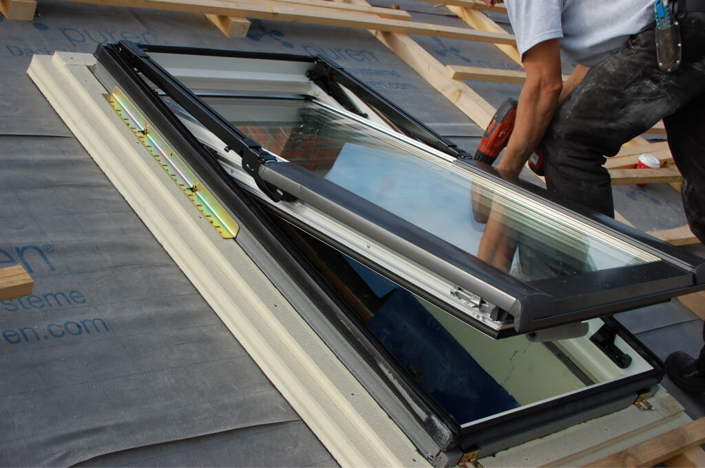 assembling fitting a roof window skylight